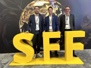 Group photo taken at the 9th Singapore FinTech Festival: Yahya Yousofzai, Julian Schmeing and Wolfgang Schlaffer